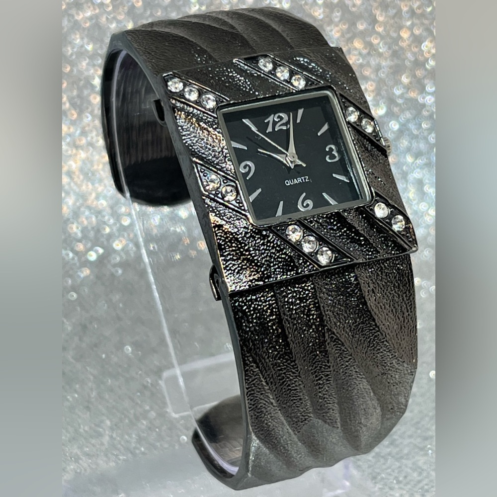 Black and gray cuff style bracelet with gemstones unbranded brand new battery!